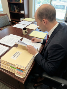 Attorney applying football discipline in law practice by reviewing Workers Compensation files.